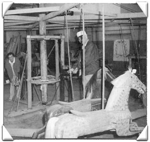 Image: Cranking the carousel by hand.