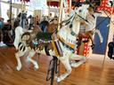 Palomino wild horse with pelt and quiver.