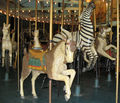 (L-R) Herschell-Spillman Outside Row Goat, 2nd Row Zebra and 3rd Row Dog